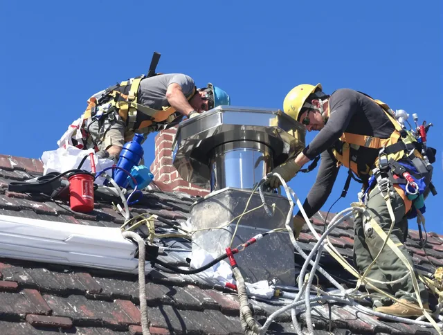 Protective chimney cap installed by Beachwood Chimney Sweep in Beachwood, OH
