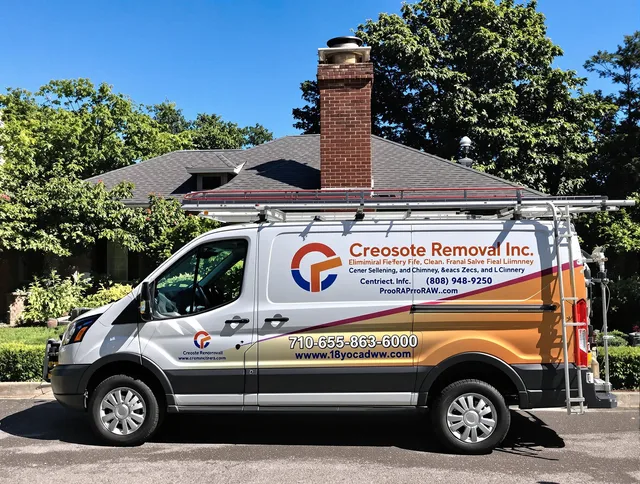 Beachwood Chimney Sweep technician removing creosote safely in Beachwood, OH