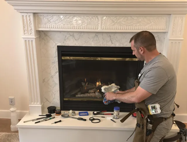 Beachwood Chimney Sweep performing fireplace maintenance in Beachwood, OH